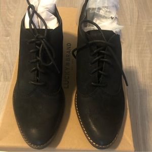 Lucky brand women’s lace up booty black leather new in box 7.5.